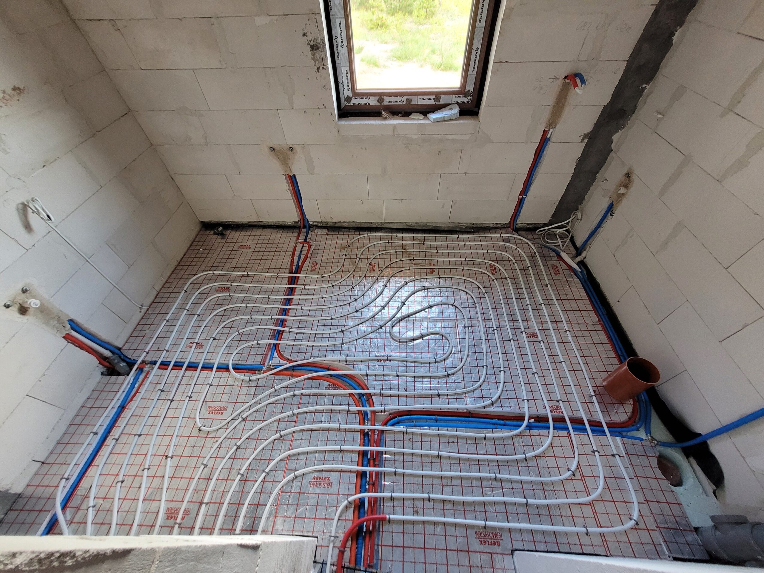 Wykonanie instalacji wodnej, kanalizacyjnej oraz ogrzewania podłogowego w nowym budynku